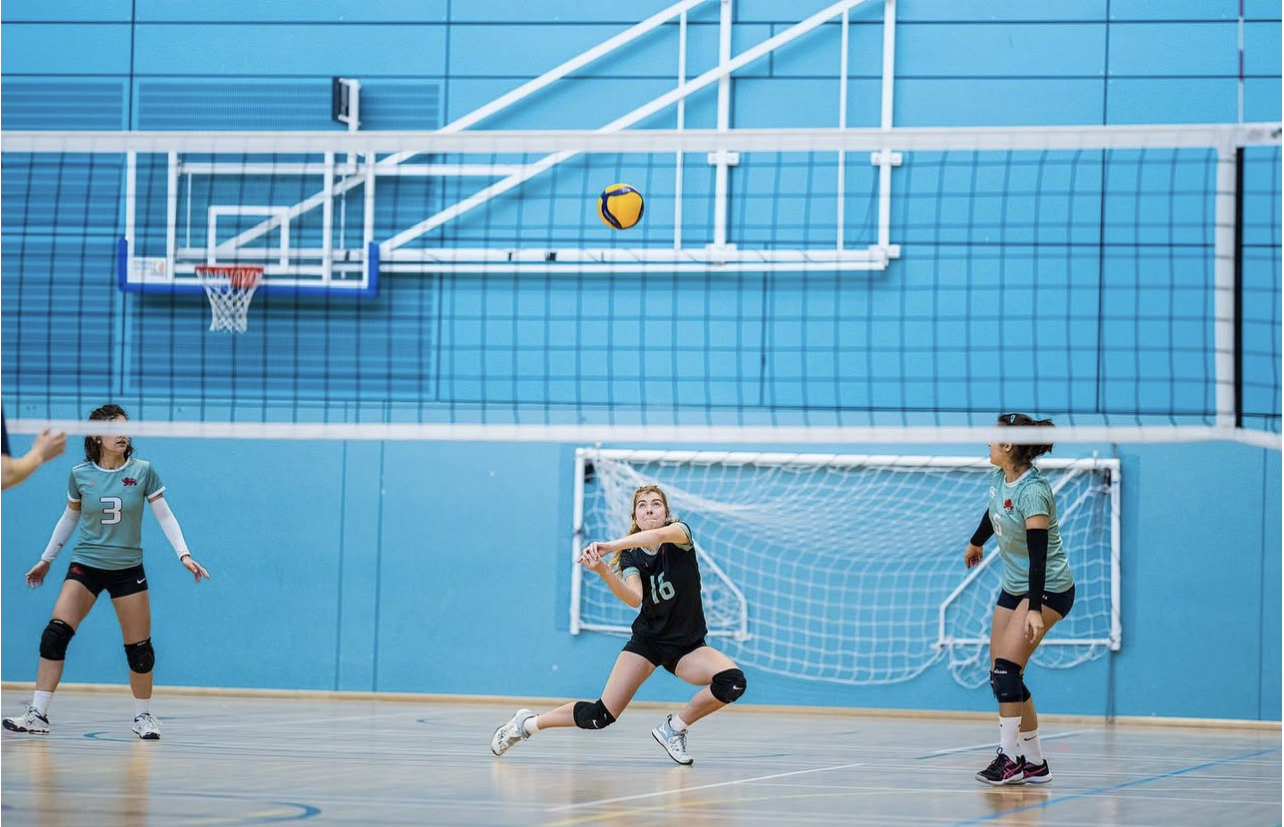 Caroline playing volleyball