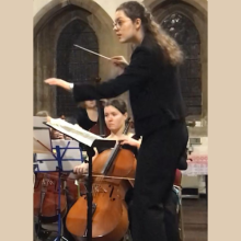 Maddie Melville Smith conducting 